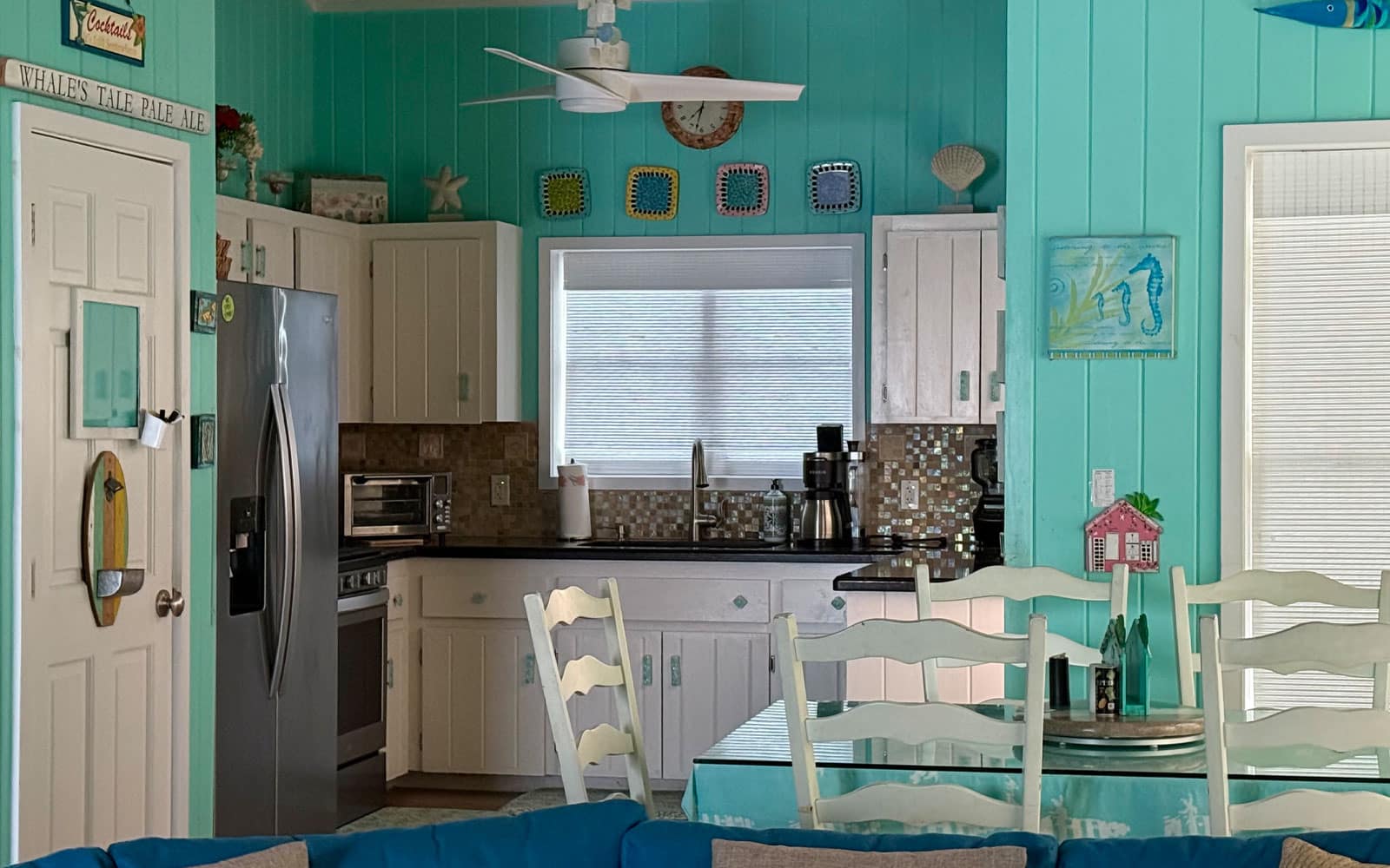 Fully equipped kitchen with granite counters and island seating