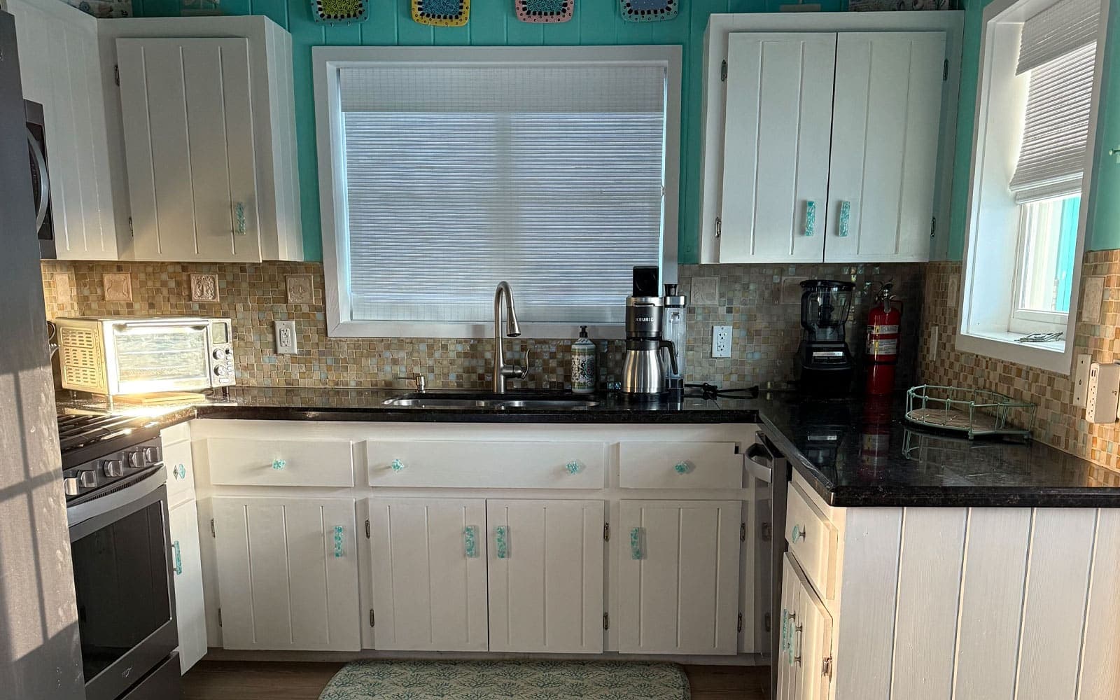 Kitchen detail with stainless-steel appliances and prep space