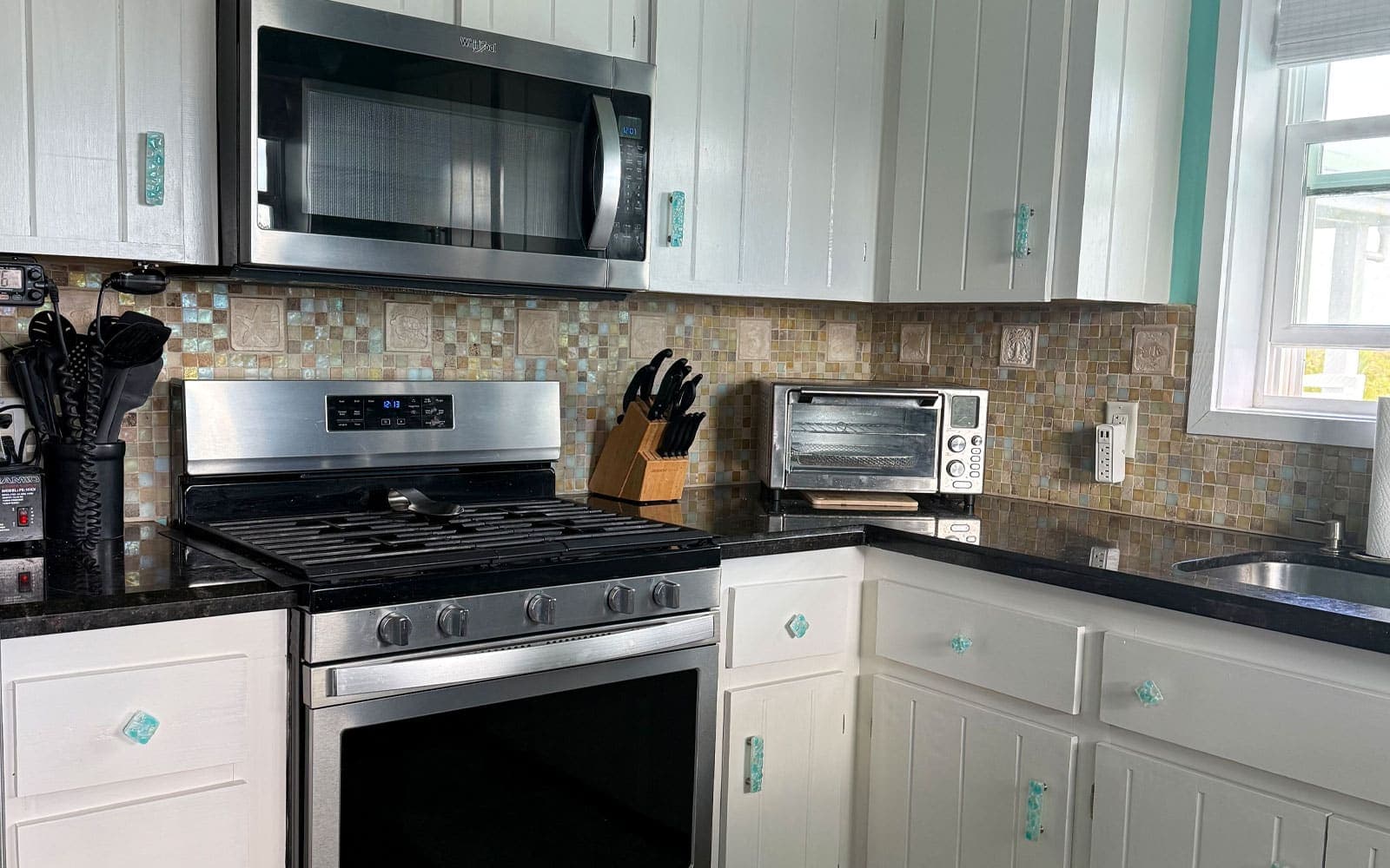 Another angle of the bright island kitchen
