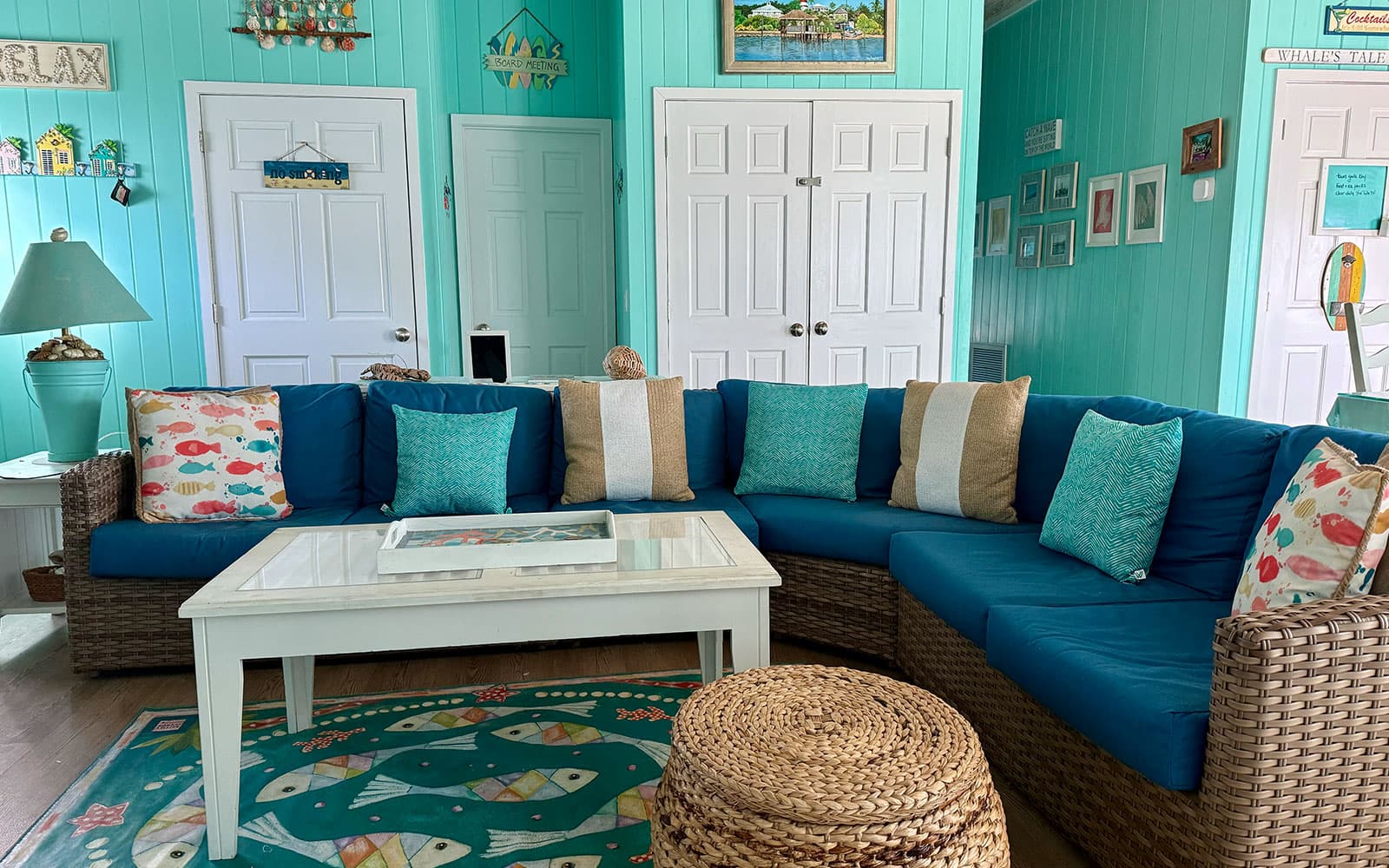 Side angle of the open-plan living room with plush seating