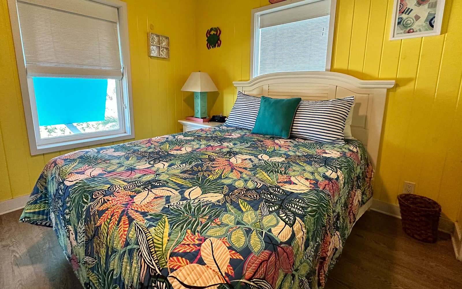 Queen bedroom with airy coastal styling